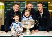 20 November 2011; Dublin players Paul Flynn, Eoghan O'Gara and Kevin Nolan when they signed a copy of the Dublin book  'A Rare Auld Season' for three year old Niamh Flynn, and four year old Saul Farrell Fogarty, from Ratoath, Co. Meath, in Easons, O'Connell Street, Dublin. Picture credit: Ray McManus / SPORTSFILE