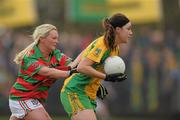 20 November 2011; Grace Rogers, Stabannon, in action against Sheree Slevin, Lisnaskea. Tesco All-Ireland Intermediate Ladies Football Club Championship Final, Lisnaskea v Stabannon, St. Mary’s Park, Scotstown, Monaghan. Photo by Sportsfile