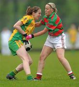 20 November 2011; Andrea Carney, Stabannon, in action against Claire Woods, Lisnaskea. Tesco All-Ireland Intermediate Ladies Football Club Championship Final, Lisnaskea v Stabannon, St. Mary’s Park, Scotstown, Monaghan. Photo by Sportsfile