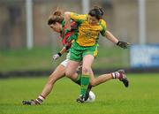 20 November 2011; Katie Mohan, Lisnaskea, in action against Mary Maloney, Stabannon. Tesco All-Ireland Intermediate Ladies Football Club Championship Final, Lisnaskea v Stabannon, St. Mary’s Park, Scotstown, Monaghan. Photo by Sportsfile