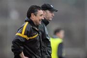 20 November 2011; Dr. Crokes, Kerry, manager Harry O'Neill, left, and Kilmurry-Ibrickane, Clare, manager John Kennedy during the final moments of the game. AIB Munster GAA Football Senior Club Championship Semi-Final, Dr. Crokes, Kerry v Kilmurry-Ibrickane, Clare, Dr. Crokes GAA Club, Killarney, Co. Kerry. Picture credit: Diarmuid Greene / SPORTSFILE