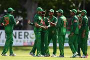 19 May 2017; Mosaddek Hossain of Bangladesh, third from left, is congratulated by team mates after catching out William Porterfield of Ireland during the One Day International match between Ireland and Bangladesh at Malahide Cricket Club in Dublin. Photo by Sam Barnes/Sportsfile