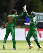 19 May 2017; Sunzamul Islam of Bangladesh, left, is congratulated by Mushfizur Rahim of Bangladesh after claiming the wicket of Ed Joyce of Ireland during the One Day International match between Ireland and Bangladesh at Malahide Cricket Club in Dublin. Photo by Sam Barnes/Sportsfile