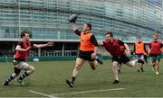 19 May 2017; The first ever Cadbury #BoostYourAwareness Touch rugby Blitz took place today in Lansdowne Rugby Football Club. The day-long event, which was held in aid of Cadbury’s charity partner Aware, aims to highlight and educate participants on the importance of maintaining positive mental health by staying active. Pictured are Isaac Boss, former Ireland, Leinster and Ulster player, and now representing Rugby Players Ireland, who played for the Titan Experience team, in action against Meldan McHugh, left, from Headford, Co Galway, playing for HSBC team, and Liam O'Higgins, right, from Middleton, Cork, playing for the HSBC team, at Lansdowne RFC in Lansdowne Road, Dublin. Photo by Cody Glenn/Sportsfile