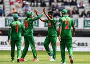 19 May 2017; Mushfiqur Rahim of Banglasdesh, second from right, is congratulated by Soumya Sarkar of Bangladesh after claiming the wicket of Gary Wilson of Ireland during the One Day International match between Ireland and Bangladesh at Malahide Cricket Club in Dublin. Photo by Sam Barnes/Sportsfile