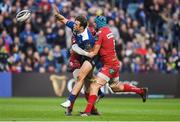 19 May 2017; Robbie Henshaw of Leinster offloads in the tackle from Rhys Patchell, left, and Tadhg Beirne of Scarlets during the Guinness PRO12 Semi-Final match between Leinster and Scarlets at the RDS Arena in Dublin. Photo by Brendan Moran/Sportsfile