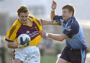 31 May 2006; Paddy Whitty, Wexford, in action against Conor McCormack, Dublin. Leinster Junior Football Championship, Quarter-Final, Dublin v Wexford, Parnell Park, Dublin. Picture credit: Brian Lawless / SPORTSFILE