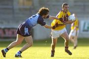31 May 2006; M.J. Cooper, Wexford, in action against Danny O'Reilly, Dublin. Leinster Junior Football Championship, Quarter-Final, Dublin v Wexford, Parnell Park, Dublin. Picture credit: Brian Lawless / SPORTSFILE