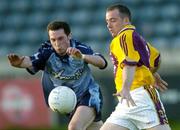 31 May 2006; James Galvin, Wexford, in action against Shay Keogh, Dublin. Leinster Junior Football Championship, Quarter-Final, Dublin v Wexford, Parnell Park, Dublin. Picture credit: Brian Lawless / SPORTSFILE