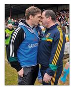 20 March 2011; Different colours, same application. Kieran McGeeney and Séamus McEnaney get acquainted  on the St Conleth’s Park touchline in a scene that coins the post-match phrase ‘belly-tickling’. Picture credit; David Maher / SPORTSFILE
