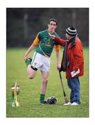 6 February 2011; Who says multi-tasking is the preserve of the fairer sex? Stephen Clynch strikes an unusual pose mid-stretch, with silverware claimed and words to unload to Jimmy Geoghegan of the Meath Chronicle.. Picture credit; Ray McManus / SPORTSFILE