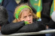 20 November 2011; An Aherlow supporter watches the game. Tesco All-Ireland Junior Ladies Football Club Championship Final, Aherlow v Sperrin Óg, St. Peregrine’s, Clonsilla, Dublin. Picture credit: Pat Murphy / SPORTSFILE