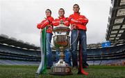 21 November 2011; Oulart the Ballagh manager Liam Dunne alongside captain Keith Rossiter, right, and player Paul Roche, left, at an AIB Leinster GAA Hurling Senior Championship Final Photocall, Croke Park, Dublin. Photo by Sportsfile