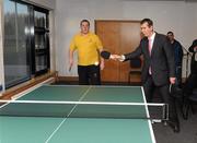 22 November 2011; Phillip Patton, Special Olympics club, Banbridge, Co. Down, with Health Minister Edwin Poots, during a Table tennis game at the announcement of a four year cross departmental funding package worth £2.296m for Special Olympics Ulster. Five government departments - Department of Culture, Arts and Leisure, Department of Health, Social Services and Public Safety, Department of Education, Department of Social Development and The Office of First Minister and Deputy First Minister have come together to agree the significant funding package, which will be delivered through Sport Northern Ireland over the next four years. The Pavilion, Stormont, Belfast, Co. Antrim. Picture credit: Oliver McVeigh / SPORTSFILE