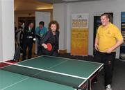 22 November 2011; Phillip Patton, Special Olympics club, Banbridge, Co. Down, with Sports Minister Carál Ní Chulilín during a Table tennis game at the announcement of a four year cross departmental funding package worth £2.296m for Special Olympics Ulster. Five government departments - Department of Culture, Arts and Leisure, Department of Health, Social Services and Public Safety, Department of Education, Department of Social Development and The Office of First Minister and Deputy First Minister have come together to agree the significant funding package, which will be delivered through Sport Northern Ireland over the next four years. The Pavilion, Stormont, Belfast, Co. Antrim. Picture credit: Oliver McVeigh / SPORTSFILE