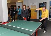 22 November 2011; Phillip Patton, Special Olympics club, Banbridge, Co. Down, with Sports Minister Carál Ní Chulilín during a Table tennis game at the announcement of a four year cross departmental funding package worth £2.296m for Special Olympics Ulster. Five government departments - Department of Culture, Arts and Leisure, Department of Health, Social Services and Public Safety, Department of Education, Department of Social Development and The Office of First Minister and Deputy First Minister have come together to agree the significant funding package, which will be delivered through Sport Northern Ireland over the next four years. The Pavilion, Stormont, Belfast, Co. Antrim. Picture credit: Oliver McVeigh / SPORTSFILE