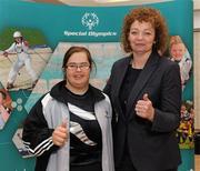 22 November 2011; Una McGarry, Salto Special Olympics club, Belfast, with Sports Minister Carál Ní Chulilín at the announcement of a four year cross departmental funding package worth £2.296m for Special Olympics Ulster. Five government departments - Department of Culture, Arts and Leisure, Department of Health, Social Services and Public Safety, Department of Education, Department of Social Development and The Office of First Minister and Deputy First Minister have come together to agree the significant funding package, which will be delivered through Sport Northern Ireland over the next four years. The Pavilion, Stormont, Belfast, Co. Antrim. Picture credit: Oliver McVeigh / SPORTSFILE