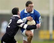 8 February 2004; Chris Conway, Laois, is tackled by Noel McGuire, Sligo. Allianz National Football League, Division 1B, Laois v Sligo, O'Moore Park, Portlaoise, Co. Laois. Picture credit; Matt Browne / SPORTSFILE