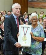 20 May 2017; Pam Beacom is presented with a Distinguished Service Award by Terry Buckley, Chairperson, Special Olympics Ireland, during the Special Olympics Ireland AGM 2017 at Crowne Plaza in Blanchardstown, Dublin. Photo by Ray McManus/Sportsfile