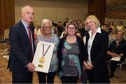 20 May 2017; Pam Beacom, accompanied by her daughter Aisling, is presented with a Distinguished Service Award by Terry Buckley, Chairperson, Special Olympics Ireland, and  Sarah Keane, President of the Olympic Council of Ireland, during the Special Olympics Ireland AGM 2017 at Crowne Plaza in Blanchardstown, Dublin. Photo by Ray McManus/Sportsfile