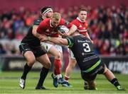 20 May 2017; Keith Earls of Munster is tackled by Scott Baldwin, left, and Rhodri Jones of Ospreys during the Guinness PRO12 semi-final match between Munster and Ospreys at Thomond Park in Limerick. Photo by Brendan Moran/Sportsfile