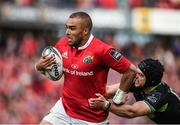 20 May 2017; Simon Zebo of Munster breaks the tackle of Dan Evans of Ospreys before going on to score his side's second try during the Guinness PRO12 semi-final between Munster and Ospreys at Thomond Park in Limerick. Photo by Diarmuid Greene/Sportsfile