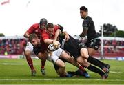 20 May 2017; Andrew Conway of Munster scores his side's third try despite the tackles of Olly Cracknell and Tom Habberfield of Ospreys during the Guinness PRO12 semi-final match between Munster and Ospreys at Thomond Park in Limerick. Photo by Brendan Moran/Sportsfile