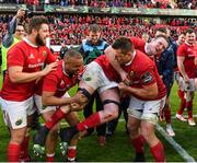 20 May 2017; Donnacha Ryan of Munster is lifted by team-mates Simon Zebo and CJ Stander after the Guinness PRO12 semi-final match between Munster and Ospreys at Thomond Park in Limerick. Photo by Brendan Moran/Sportsfile