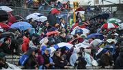20 May 2017; Supporters take shelter due to heavy rain during the Ulster GAA Football Senior Championship Preliminary Round match between Monaghan and Fermanagh at St Tiernach's Park in Clones, Co. Monaghan. Photo by Philip Fitzpatrick/Sportsfile