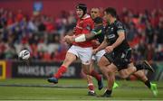 20 May 2017; Tyler Bleyendaal of Munster kicks forward as he is tackled by Josh Matavesi of Ospreys after the Guinness PRO12 semi-final match between Munster and Ospreys at Thomond Park in Limerick. Photo by Brendan Moran/Sportsfile