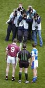 18 July 2004; Rival captains Chris Conway, Laois, and David O'Shaughnessy, Westmeath, stand with referee Pat McEnaney before the toss.  Bank of Ireland Leinster Senior Football Championship Final, Laois v Westmeath, Croke Park, Dublin. Picture credit; Ray McManus / SPORTSFILE