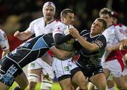 25 November 2011; Ian Humphreys, Ulster, is tackled by Graeme Morrison, left, and Duncan Weir, Glasgow Warriors. Celtic League, Glasgow Warriors v Ulster, Firhill Arena, Glasgow, Scotland. Picture credit: Craig Watson / SPORTSFILE