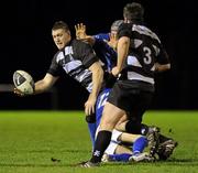 25 November 2011; Old Belvedere's Dean Moore, supported by team-mate Pa O'Regan, is tackled by Hugh Hogan and Mark Sexton, 12, St Mary's College. Ulster Bank League, Division 1A, St Mary's College v Old Belvedere, Templeville Road, Dublin. Picture credit: Matt Browne / SPORTSFILE