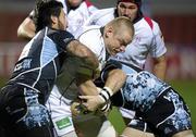 25 November 2011; Tom Court , Ulster, is tackled by Troy Nathan, left, and John Barclay, Glasgow Warriors. Celtic League, Glasgow Warriors v Ulster, Firhill Arena, Glasgow, Scotland. Picture credit: Craig Watson / SPORTSFILE