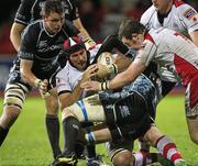 25 November 2011; Pedrie Wannenburg, Ulster is caught in possession during the game. Celtic League, Glasgow Warriors v Ulster, Firhill Arena, Glasgow, Scotland. Picture credit: Craig Watson / SPORTSFILE