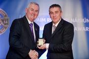 25 November 2011; Referee Garrett Duffy, from Antrim, is presented with his Christy Ring referees' award by Uachtarán CLG Criostóir Ó Cuana. 2011 National Referees' Awards Banquet, Croke Park, Dublin. Picture credit: Barry Cregg / SPORTSFILE