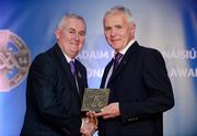 25 November 2011; Referee Seamus McGonigle, from Donegal, is presented with his Retiring Referees' award by Uachtarán CLG Criostóir Ó Cuana. 2011 National Referees' Awards Banquet, Croke Park, Dublin. Picture credit: Barry Cregg / SPORTSFILE