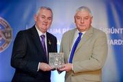 25 November 2011; Referee Seanie McMahon, from Clare, is presented with his Retiring Referees' award by Uachtarán CLG Criostóir Ó Cuana. 2011 National Referees' Awards Banquet, Croke Park, Dublin. Picture credit: Barry Cregg / SPORTSFILE