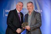 25 November 2011; Referee Pat McEnaney, from Monaghan, is presented with his Retiring Referees' award by Uachtarán CLG Criostóir Ó Cuana. 2011 National Referees' Awards Banquet, Croke Park, Dublin. Picture credit: Barry Cregg / SPORTSFILE