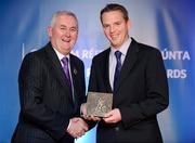 25 November 2011; Referee Eamonn Morris, from Dublin, is presented with his Retiring Referees' award by Uachtarán CLG Criostóir Ó Cuana. 2011 National Referees' Awards Banquet, Croke Park, Dublin. Picture credit: Barry Cregg / SPORTSFILE