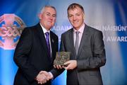 25 November 2011; Referee Dickie Murphy, from Wexford, is presented with his Retiring Referees' award by Uachtarán CLG Criostóir Ó Cuana. 2011 National Referees' Awards Banquet, Croke Park, Dublin. Picture credit: Barry Cregg / SPORTSFILE