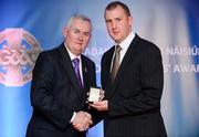 25 November 2011; Referee Alan Kelly, from Galway, is presented with his AIB GAA Hurling All-Ireland Intermediate Club Championship referees' award by Uachtarán CLG Criostóir Ó Cuana. 2011 National Referees' Awards Banquet, Croke Park, Dublin. Picture credit: Barry Cregg / SPORTSFILE