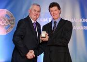 25 November 2011; Referee Tony Carroll, from Offaly, is presented with his GAA All-Ireland Hurling U21 Championship referees' award by Uachtarán CLG Criostóir Ó Cuana. 2011 National Referees' Awards Banquet, Croke Park, Dublin. Picture credit: Barry Cregg / SPORTSFILE