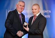 25 November 2011; Referee Barry Cassidy, from Derry, is presented with his Allianz Football League Division 4 referees' award by Uachtarán CLG Criostóir Ó Cuana. 2011 National Referees' Awards Banquet, Croke Park, Dublin. Picture credit: Barry Cregg / SPORTSFILE