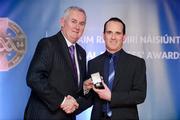 25 November 2011; Referee David Goldrick, from Meath, is presented with his International Games 2011 for International Rules referees' award by Uachtarán CLG Criostóir Ó Cuana. 2011 National Referees' Awards Banquet, Croke Park, Dublin. Picture credit: Barry Cregg / SPORTSFILE
