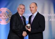 25 November 2011; Referee Cormac Reilly, from Meah, is presented with his AIB GAA Football All-Ireland Senior Club Championship referees' award by Uachtarán CLG Criostóir Ó Cuana. 2011 National Referees' Awards Banquet, Croke Park, Dublin. Picture credit: Barry Cregg / SPORTSFILE