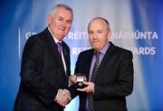 25 November 2011; Referee Marty Duffy, from Sligo, is presented with his Allianz Football League Division 2 referees' award by Uachtarán CLG Criostóir Ó Cuana. 2011 National Referees' Awards Banquet, Croke Park, Dublin. Picture credit: Barry Cregg / SPORTSFILE