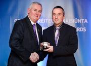 25 November 2011; Referee James McGrath, from Westmeath, is presented with his Allianz Hurling League Division 2 referees' award by Uachtarán CLG Criostóir Ó Cuana. 2011 National Referees' Awards Banquet, Croke Park, Dublin. Picture credit: Barry Cregg / SPORTSFILE