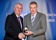 25 November 2011; Referee Fergus Smith, from Dublin, is presented with his Lory Meagher and Allianz Hurling League Division 3A referees' award by Uachtarán CLG Criostóir Ó Cuana. 2011 National Referees' Awards Banquet, Croke Park, Dublin. Picture credit: Barry Cregg / SPORTSFILE