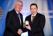 25 November 2011; Referee Derek O'Mahony, from Tipperary, is presented with his GAA All-Ireland Junior Championship referees' award by Uachtarán CLG Criostóir Ó Cuana. 2011 National Referees' Awards Banquet, Croke Park, Dublin. Picture credit: Barry Cregg / SPORTSFILE